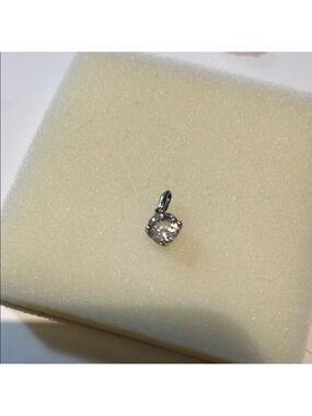 White sapphire and silver pendant